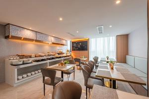 Dapur atau dapur kecil di Poltton International Apartment - Guangzhou Knowledge City Wangcun Subway Station