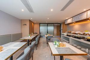 Dapur atau dapur kecil di Poltton International Apartment - Guangzhou Knowledge City Wangcun Subway Station