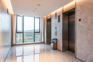 Gambar di galeri bagi Poltton International Apartment - Guangzhou Knowledge City Wangcun Subway Station di Jiufo