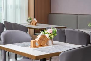 Restoran atau tempat lain untuk makan di Poltton International Apartment - Guangzhou Knowledge City Wangcun Subway Station