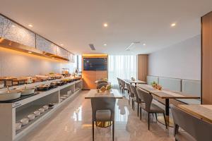 Dapur atau dapur kecil di Poltton International Apartment - Guangzhou Knowledge City Wangcun Subway Station