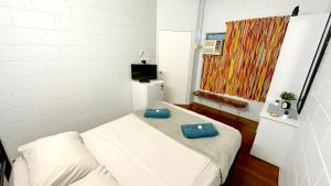 Postel nebo postele na pokoji v ubytování Cooktown Motel