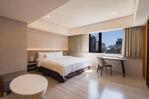 Katil atau katil-katil dalam bilik di 家美瑞品 台北 - Jiamei Hotel