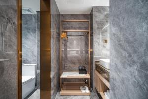 תמונה מהגלריה של Poltton International Apartment - Guangzhou Panyu Government Affairs Center בXuwen