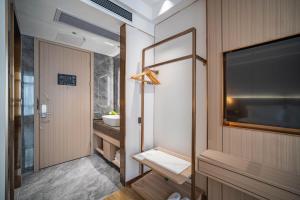תמונה מהגלריה של Poltton International Apartment - Guangzhou Panyu Government Affairs Center בXuwen