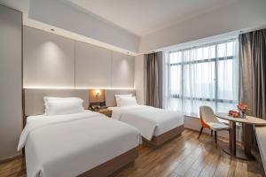 תמונה מהגלריה של Poltton International Apartment - Guangzhou Panyu Government Affairs Center בXuwen