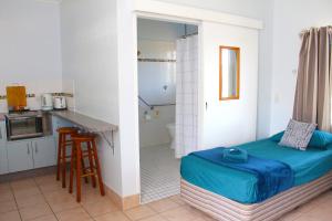 Kuchyň nebo kuchyňský kout v ubytování Cooktown Motel
