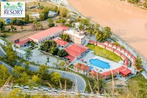 an aerial view of a resort by the beach at Kwality Beach Resort in Beni Ghāt
