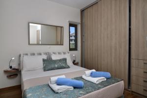 Posteľ alebo postele v izbe v ubytovaní Sunlight Breeze Villa
