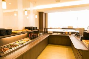 AB Hotel Ichinomiya tesisinde mutfak veya mini mutfak