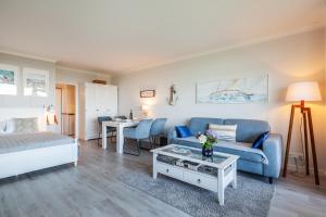 Postel nebo postele na pokoji v ubytování Timmendorfer Strand-Apartment + 20 fotografií