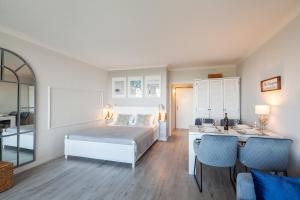 Postel nebo postele na pokoji v ubytování Timmendorfer Strand-Apartment