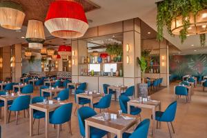 Restoran või mõni muu söögikoht majutusasutuses Riu Turquoise - All Inclusive