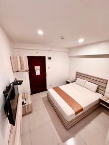 Μια τηλεόραση ή/και κέντρο ψυχαγωγίας στο Travelbee Fuente Inn