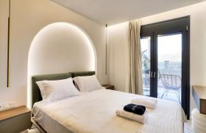 Ένα ή περισσότερα κρεβάτια σε δωμάτιο στο S&D Luxury Suites and Apartments
