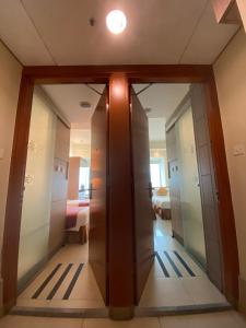 Giường trong phòng chung tại Rambler Oasis Hotel