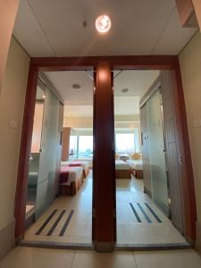 Giường trong phòng chung tại Rambler Oasis Hotel