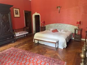 Postel nebo postele na pokoji v ubytování Château du Prada