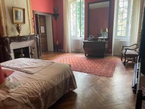 Postel nebo postele na pokoji v ubytování Château du Prada