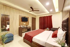 Letto o letti in una camera di Smart Plaza Hotel