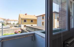 a view from a balcony with a window at Gorgeous Home In Miengo With Wifi in Miengo +6 photos