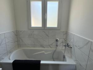 Kúpeľňa v ubytovaní Maison avec jacuzzi et sauna