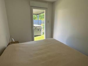 Posteľ alebo postele v izbe v ubytovaní Maison avec jacuzzi et sauna