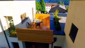 Balkón nebo terasa v ubytování Ferienwohnung Dolomitenpanorama