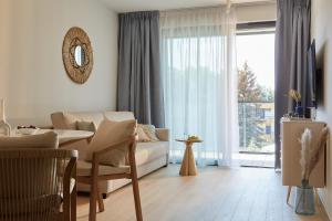 Posezení v ubytování Apartamenty In Wydma & Las
