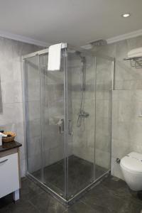 Ванная комната в Phellos Suites Boutique Hotel