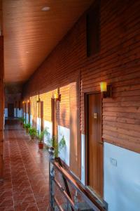 A balcony or terrace at TreeHouse Chail Villas