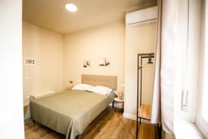 Postel nebo postele na pokoji v ubytování Guest House Nonna Rosa + 19 fotografií