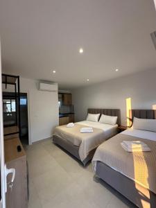 Postel nebo postele na pokoji v ubytování Summer Dream Cottage