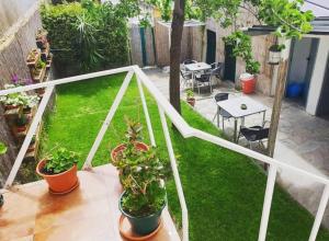 Κήπος έξω από το Apartamentos Pasiño