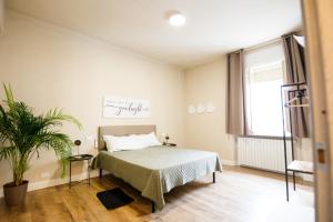 Postel nebo postele na pokoji v ubytování Guest House Nonna Rosa