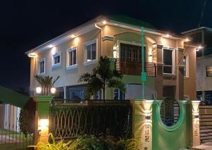 a house with lights on the front of it at The Royal Haven Herstelling GY in Nismes