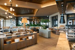 a restaurant with aasteryasteryasteryasteryasteryasteryasteryasteryasteryasteryasteryastery at samana hotel Yakushima in Yakushima