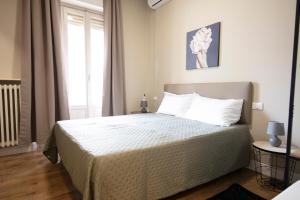 Postel nebo postele na pokoji v ubytování Guest House Nonna Rosa