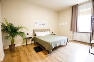 Postel nebo postele na pokoji v ubytování Guest House Nonna Rosa