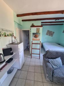 a bedroom with a bed and a table in a room at SPITIKARIOTIKO Pergola Home in Raches +67 photos