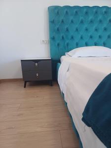 Postel nebo postele na pokoji v ubytování Wait`N Sea House