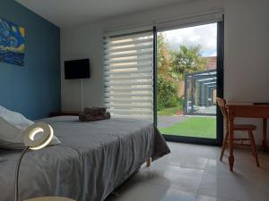 Ένα ή περισσότερα κρεβάτια σε δωμάτιο στο Access Loft Chartrain - Gîte 12 personnes +55 φωτογραφίες