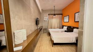 Postel nebo postele na pokoji v ubytování Big Hotel