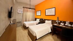 Postel nebo postele na pokoji v ubytování Big Hotel