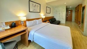 Postel nebo postele na pokoji v ubytování Big Hotel