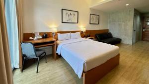 Postel nebo postele na pokoji v ubytování Big Hotel