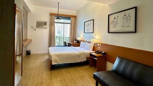 Postel nebo postele na pokoji v ubytování Big Hotel