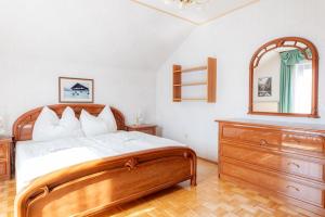 Voodi või voodid majutusasutuse NaturparkResort Haus Geigenkogel toas