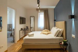 Una cama o camas en una habitación de Essence Guesthouse 6 fotos más