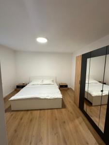 Postel nebo postele na pokoji v ubytování Apartmán Zamarovce